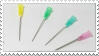 Stamp with multicoloured needles